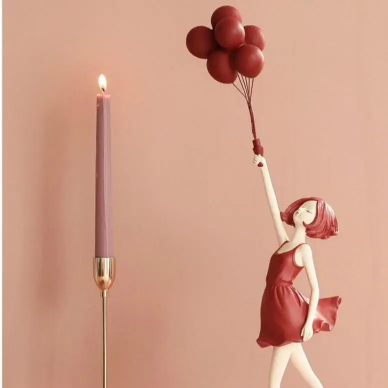Playful Balloon Girl Sculpture