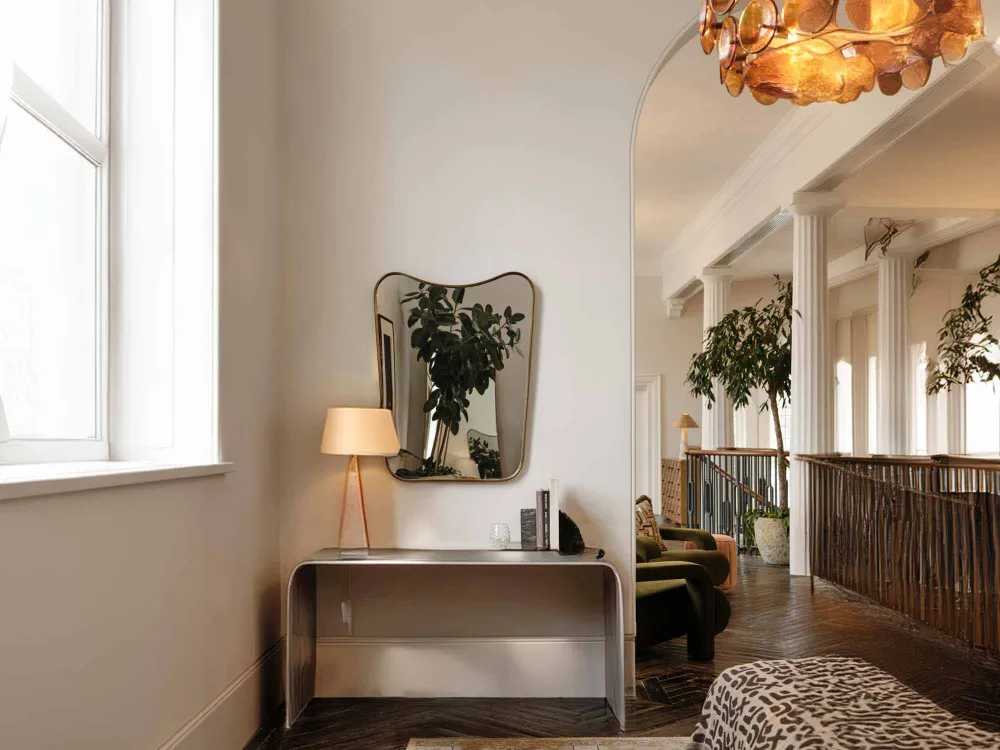 Curved Brass Frame Wall Mirror