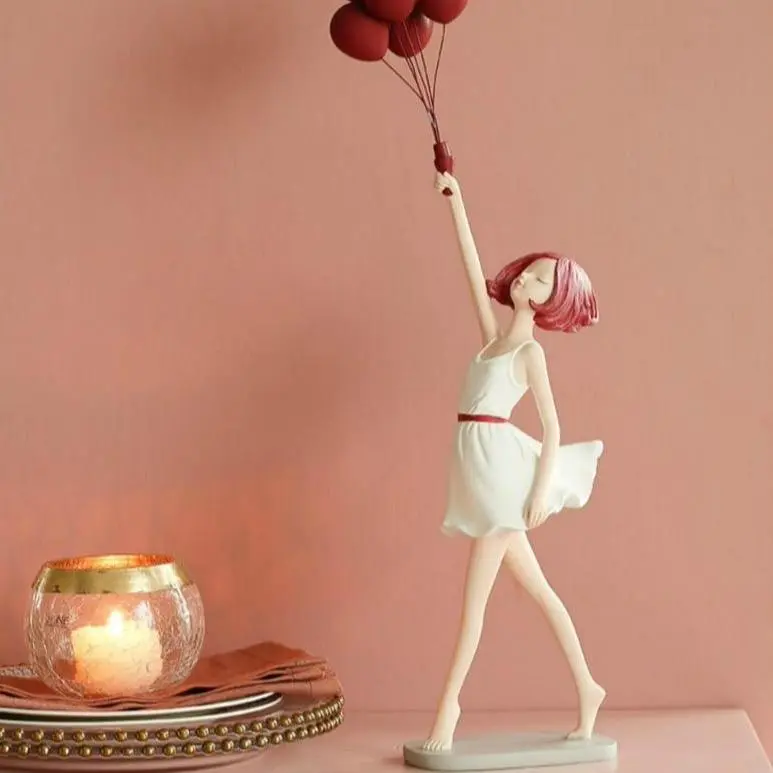 Playful Balloon Girl Sculpture