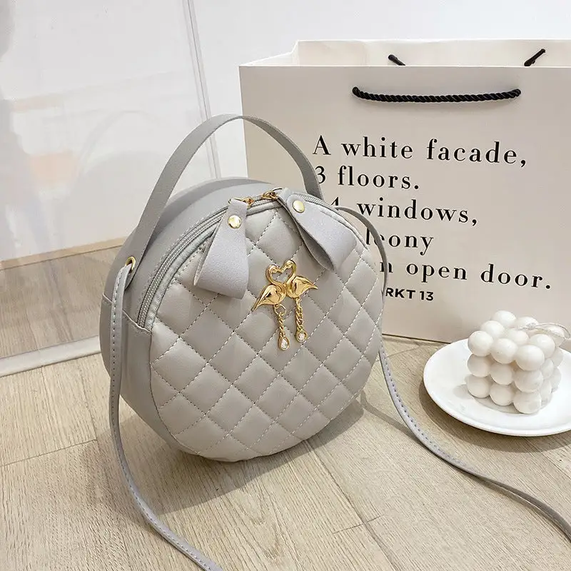Compact Quilted Round Handbag