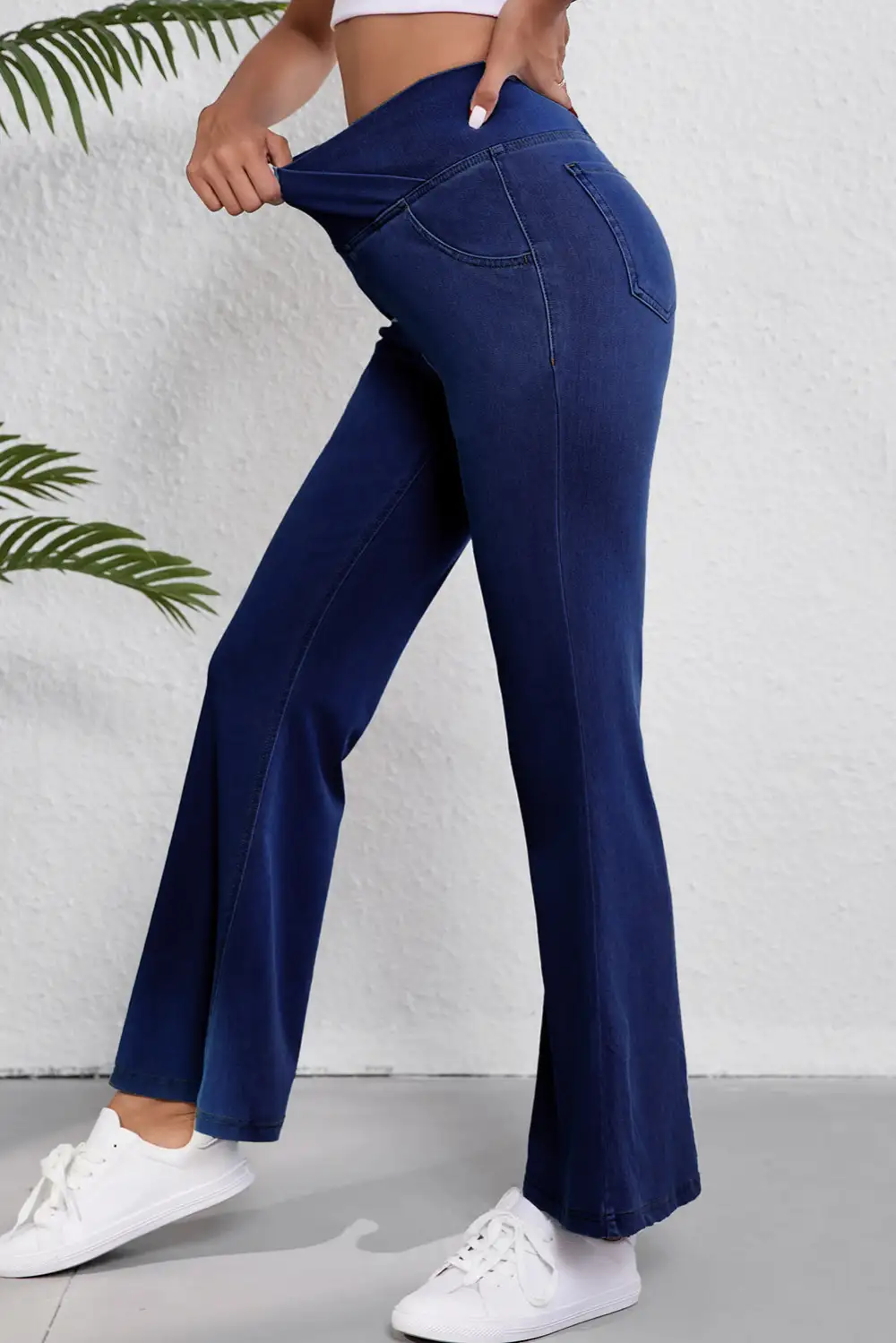 Solid Crossed Waist High Elastic Fit Flare Knit Jeans