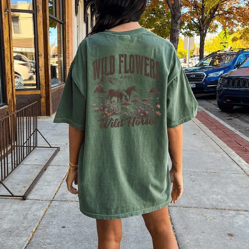 Wild Horses Wildflowers Western Cowgirl On Horse Cowboy Women's Oversized Comfort T-Shirt Back Print