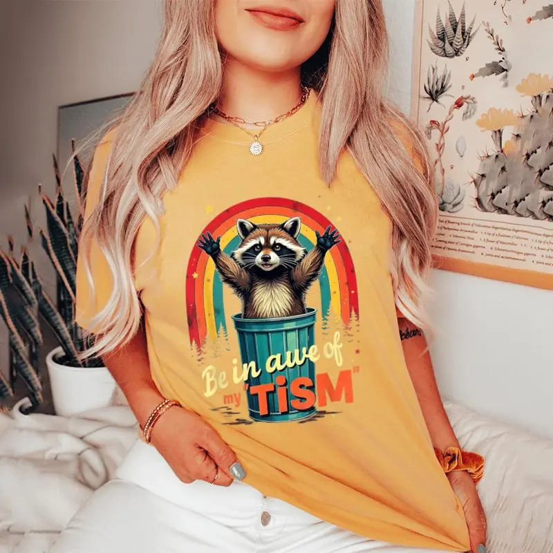 Be In Awe Of My 'Tism Autism Awareness Rainbow Raccoon Women's Oversized Comfort T-Shirt