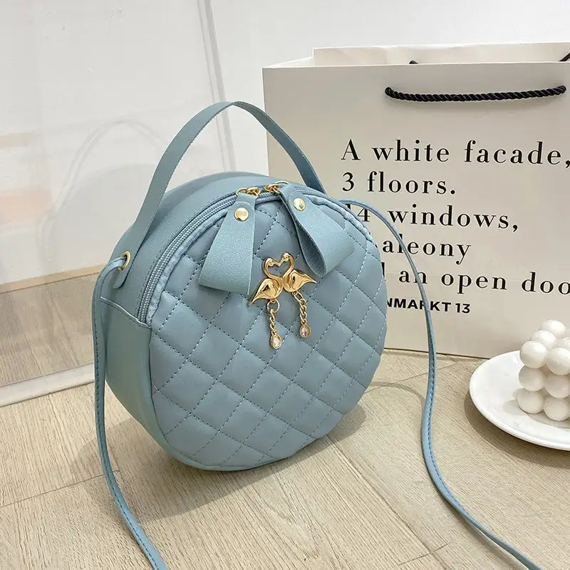 Compact Quilted Round Handbag