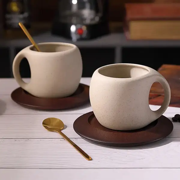 Sculpted Ceramic Coffee Cup And Saucer Set