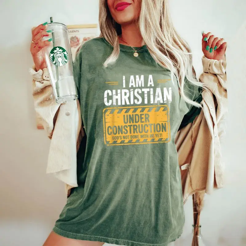 Christian Under Construction God Not Done Yet Spiritual Fun Women's Oversized Comfort T-Shirt