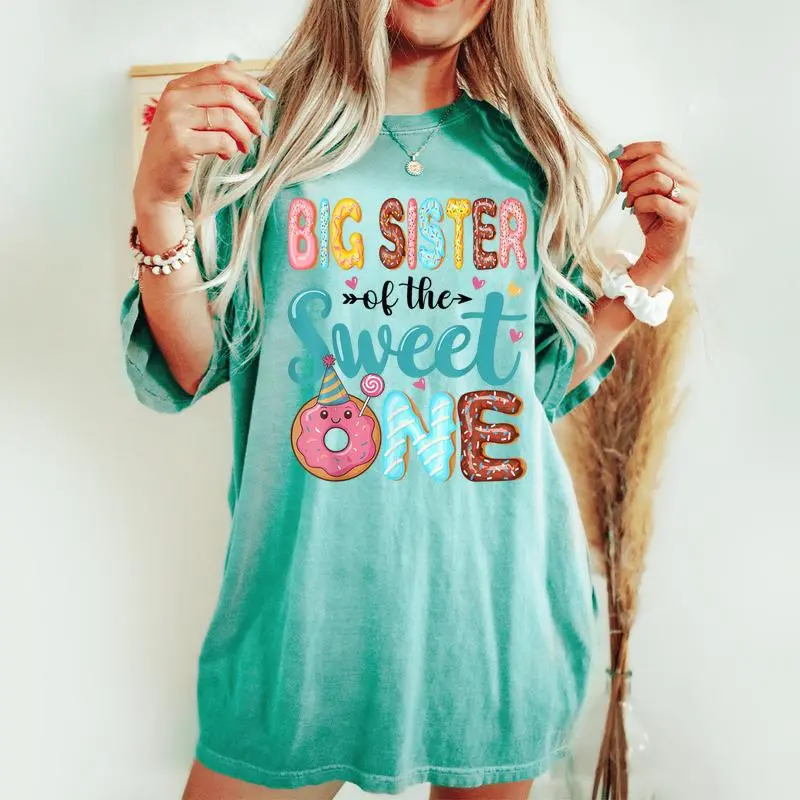 Big Sister Of The Sweet One 1St Birthday Girl Donut Party Women's Oversized Comfort T-shirt