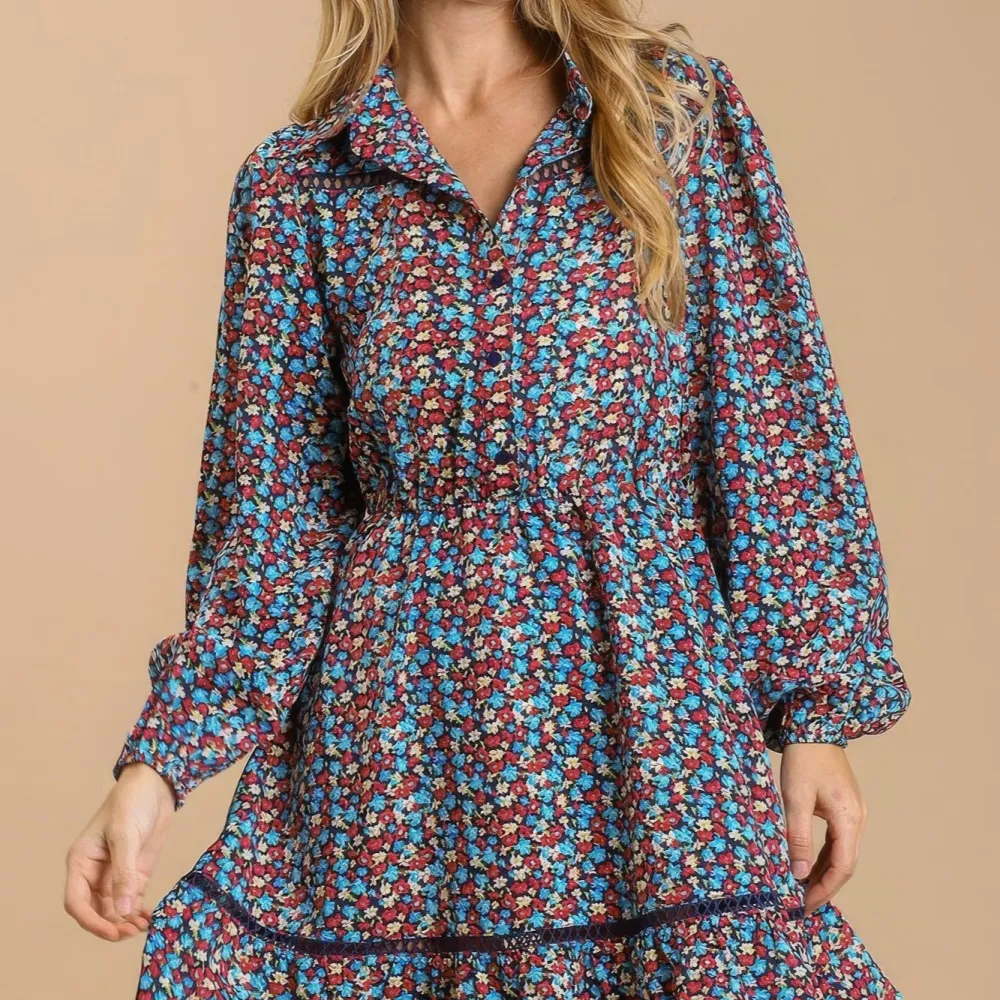 Collared neckline button down floral print dress with crochet trimmed details