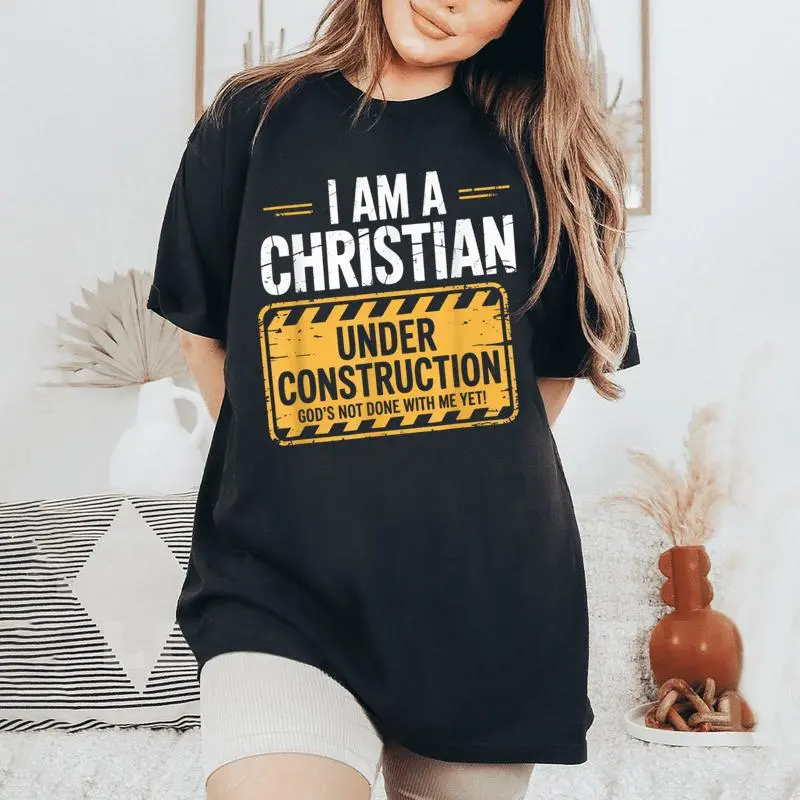 Christian Under Construction God Not Done Yet Spiritual Fun Women's Oversized Comfort T-Shirt