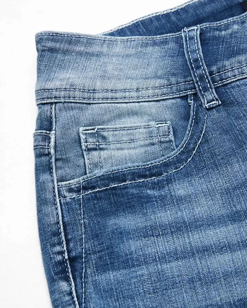 Embroidered Mid-Rise Flared Jeans