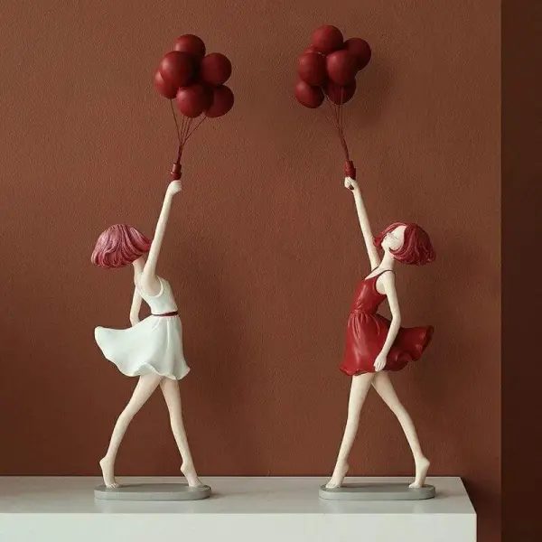 Playful Balloon Girl Sculpture