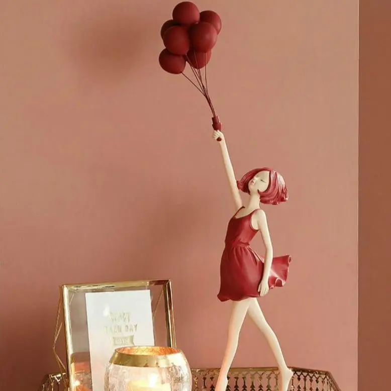 Playful Balloon Girl Sculpture