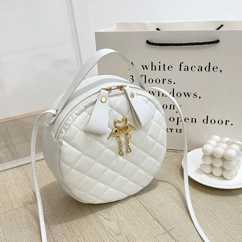 Compact Quilted Round Handbag