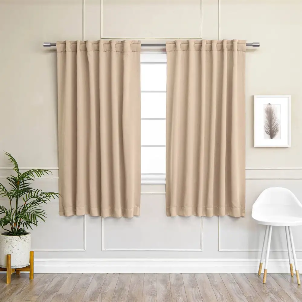 Understated Blackout Polyester Solid Back-Tab Curtain Panel