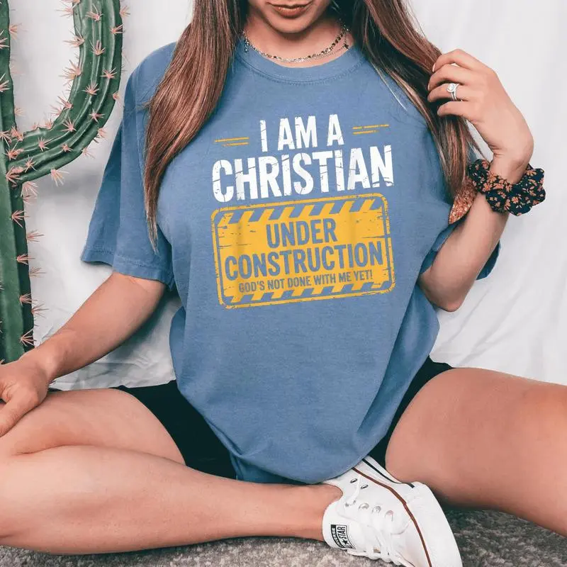 Christian Under Construction God Not Done Yet Spiritual Fun Women's Oversized Comfort T-Shirt