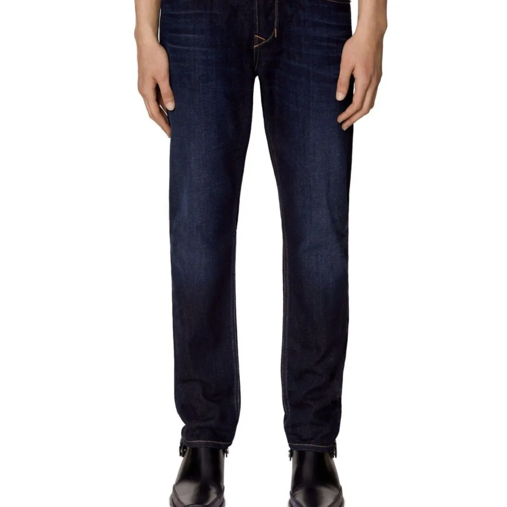 Tapered Stretch Denim Jeans