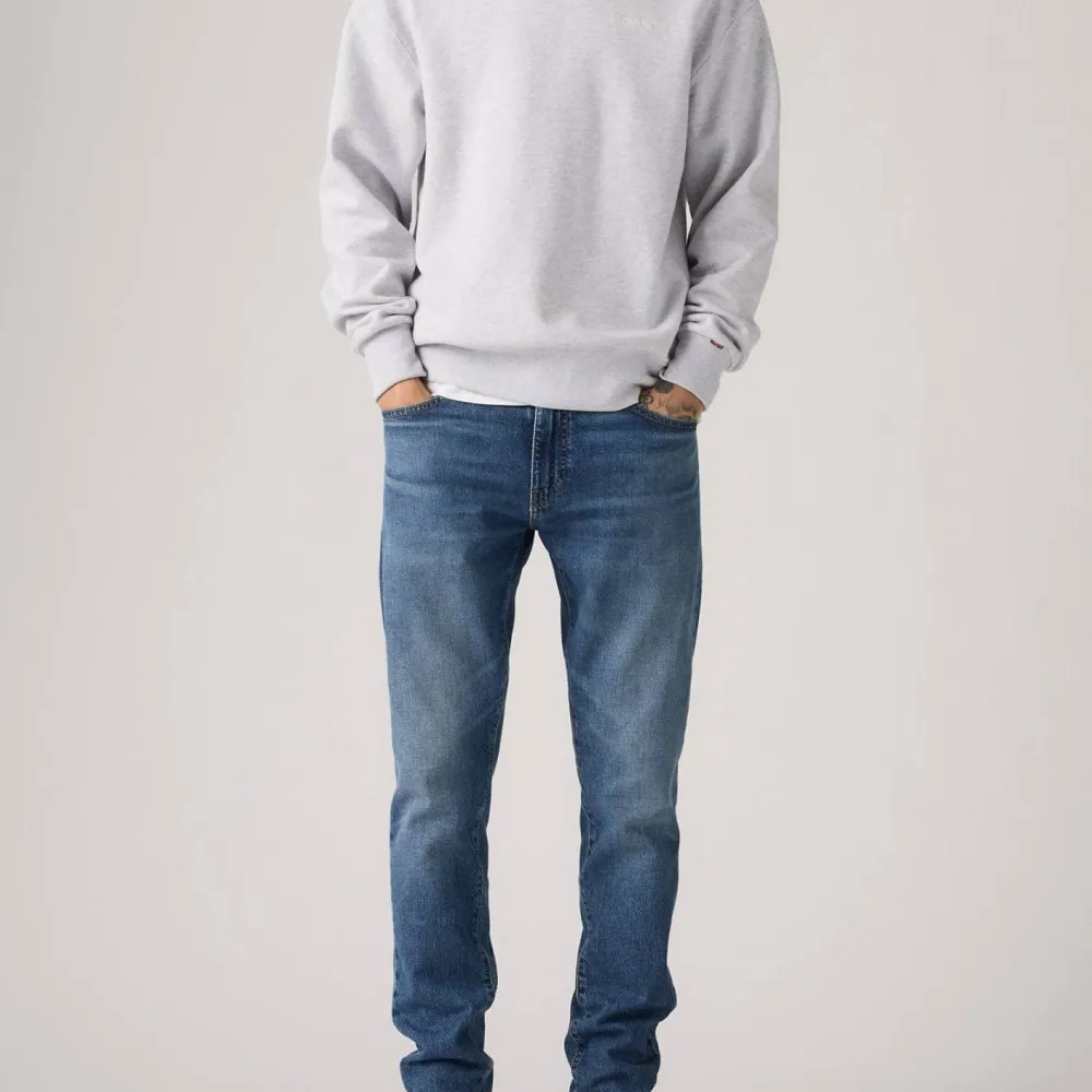 Relaxed Slim-Fit Stretch Denim Jeans