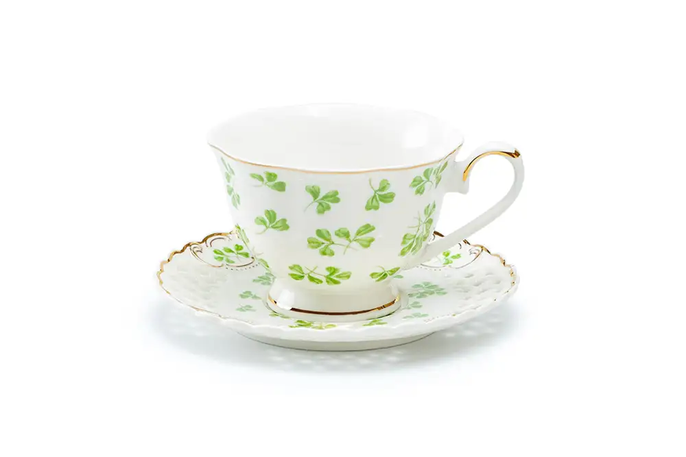 Shamrock Pierced Porcelain Tea Cup And Saucer