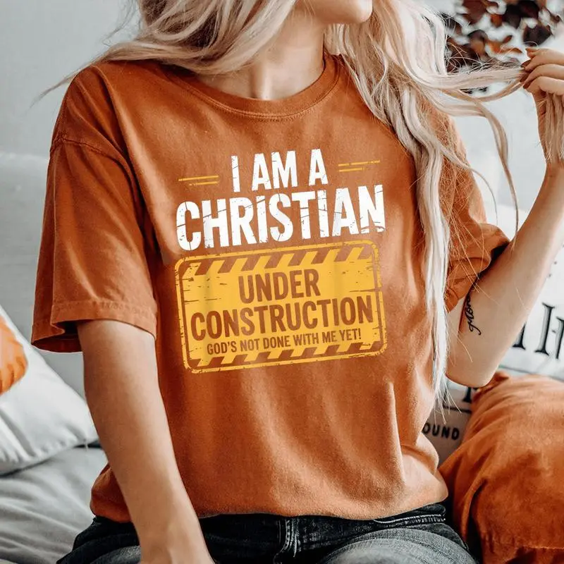 Christian Under Construction God Not Done Yet Spiritual Fun Women's Oversized Comfort T-Shirt