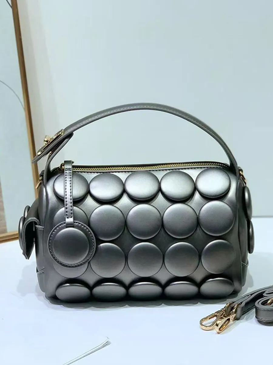 Rhea Button Cylinder Bag