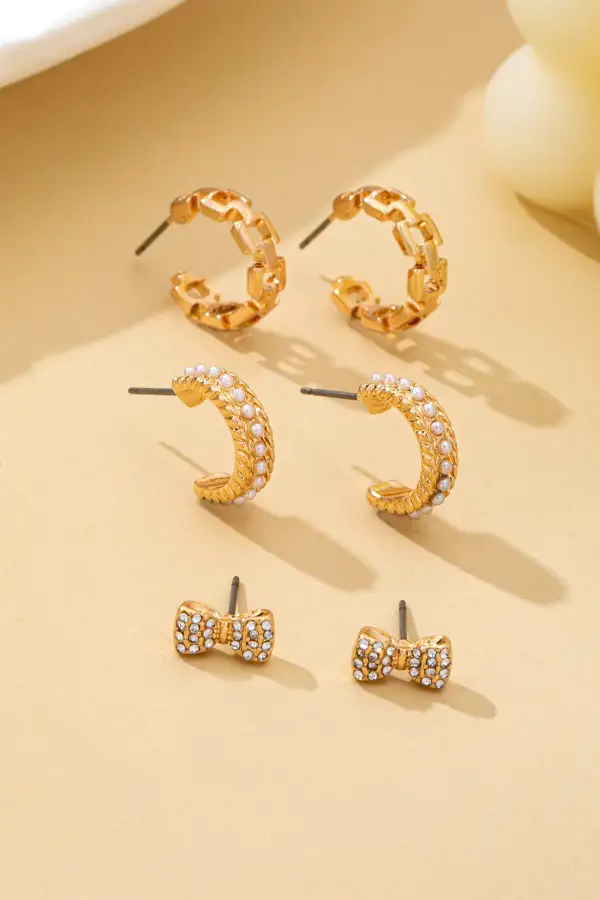 Trio Bow Pearl Huggie And