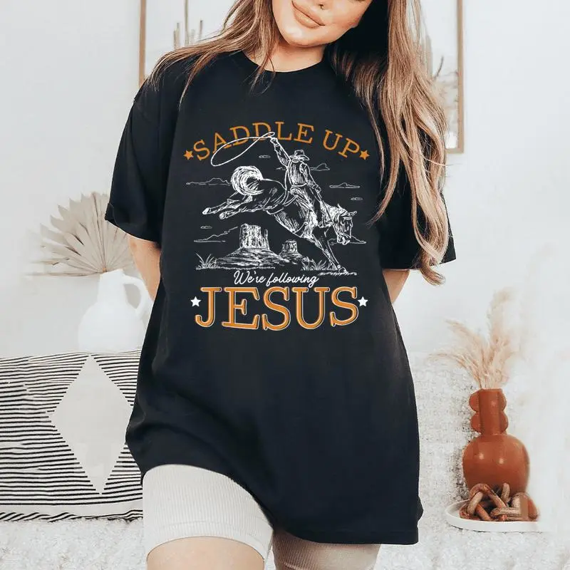 Saddle Up We're Following Jesus Retro Christian Western Women's Oversized Comfort T-Shirt